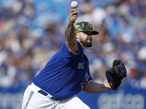 Alek Manoah of the Toronto Blue Jays pitches in the seventh inning of their MLB game against the Cincinnati Reds at Rogers Centre on May 21, 2022 in Toronto, Canada.