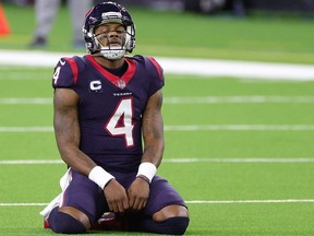 Deshaun Watson of the Houston Texans reacts to a play during a game against the Tennessee Titans at NRG Stadium on January 03, 2021 in Houston, Texas.