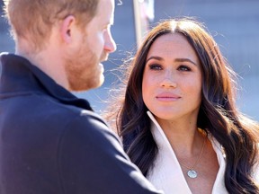 Prince Harry, Duke of Sussex and Meghan, Duchess of Sussex compete in athletics on the second day of the 2020 Invictus Games in The Hague on April 17, 2022 in The Hague, Netherlands.