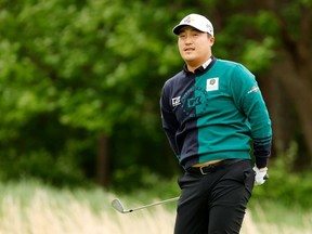 Kyoung-Hoon Lee of South Korea plays his shot from the third tee during the final round of the Wells Fargo Championship at TPC Potomac Clubhouse on May 08, 2022 in Potomac, Maryland.