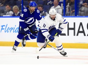 Colin Blackwell of the Toronto Maple Leafs looks to pass in the third period during Game Five of  the First Round of the 2022 Stanley Cup Playoffs against the Tampa Bay Lightning at Amalie Arena on May 12, 2022 in Tampa, Florida.