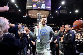 Luka Doncic of the Dallas Mavericks leaves the court after defeating the Phoenix Suns 123-90 in Game 7 of the 2022 NBA Playoffs Western Conference Semifinals at Footprint Center on May 15, 2022 in Phoenix, Arizona.