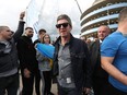 Noel Gallagher, Musician and Manchester City fan leaves the stadium after their side finished the season as Premier League champions during the Premier League match between Manchester City and Aston Villa at Etihad Stadium on May 22, 2022 in Manchester, England.