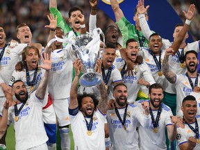 Marcelo of Real Madrid lifts the UEFA Champions League trophy after their sides victory in the UEFA Champions League final match between Liverpool FC and Real Madrid at Stade de France on May 28, 2022 in Paris, France. (Photo by Shaun Botterill/Getty Images)
