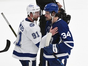 Tampa Bay Lightning forward Steven Stamkos shakes hands with Toronto Maple Leafs forward Auston Matthews.