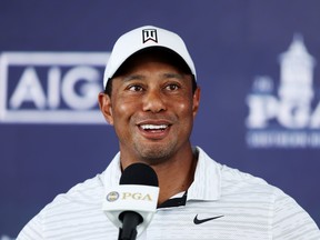 Tiger Woods speaks to media yesterdayt after a practice round prior for this week's PGA Championship at Southern Hills Country Club in Tulsa, Oklahoma.