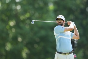 Canadian Adam Hadwin plays his shot from the 14th tee during the first round of the PGA Championship at Southern Hills Country Club in Tulsa, Oklahoma.