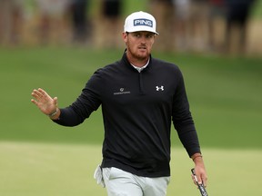 Mito Pereira of Chile acknowledges the gallery on Saturday during the third round of the PGA Championship at Southern Hills Country Club in Tulsa, Okla.