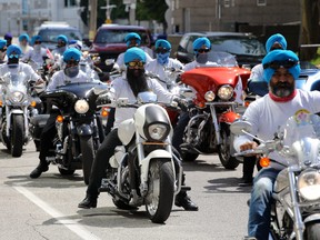 Sikh Motorcycle Club of Ontario members participate in their Ride to Recognize First Responders in Windsor, Ont., on July 25, 2020.