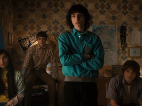 (L to R) Eduardo Franco as Argyle, Noah Schnapp as Will Byers, Finn Wolfhard as Mike Wheeler, and Charlie Heaton as Jonathan Byers in Stranger Things.