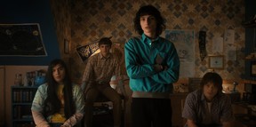 (L to R) Eduardo Franco as Argyle, Noah Schnapp as Will Byers, Finn Wolfhard as Mike Wheeler, and Charlie Heaton as Jonathan Byers in Stranger Things.