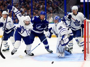 Jack Campbell of the Maple Leafs stops a shot from Ondrej Palat of the Tampa Bay Lightning in the second period during Game 3 in Tampa on Friday, May 6, 2022.