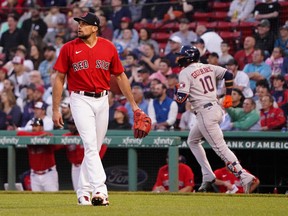 Boston Red Sox starting pitcher Nathan Eovaldi (17) reacts after Houston Astros first baseman Yuli Gurriel (10) hits a two run home run in the second inning at Fenway Park.