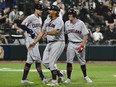 Cleveland Guardians right fielder Josh Naylor, center, celebrates with teammates after hitting a three run home run against the Chicago White Sox during the eleventh inning at Guaranteed Rate Field. Mandatory Credit: -