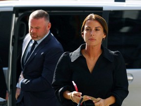 Coleen Rooney arrives with her husband, Derby County Manager Wayne Rooney, at the Royal Courts of Justice, in London May 17, 2022.