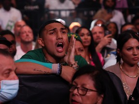 Boxer Teofimo Lopez shouts during the Gervonta Davis vs Rolando Romero  fight for Davis' WBA World lightweight title at Barclays Center on May 28, 2022 in Brooklyn, New York.