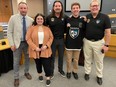 OJHL commissioner Marty Savoy, Tigers GM Sierra Costa, Tigers owner Jim Thomson, Tigers captain Connor Van Weelie and Tigers head coach Greg Johnston.