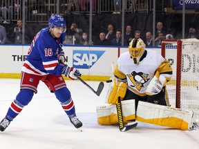 Pittsburgh Penguins goaltender Casey DeSmith (1) makes a save as New York Rangers centre Ryan Strome looks on at Madison Square Garden.