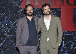 Matt Duffer, left, and Ross Duffer attend the premiere of Stranger Things 4 at Netflix Studios Brooklyn on Saturday, May 14, 2022.