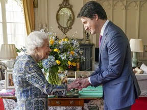 Queen Elizabeth receives Prime Minister Justin Trudeau during an audience at Windsor Castle on Monday, March 7, 2022.