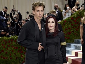 Elvis star Austin Butler and Priscilla Presley attend The Metropolitan Museum of Art’s Costume Institute benefit gala celebrating the opening of the “In America: An Anthology of Fashion” exhibition on Monday, May 2, 2022, in New York.