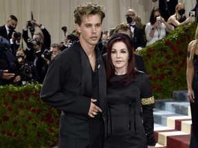 Elvis star Austin Butler and Priscilla Presley attend The Metropolitan Museum of Art's Costume Institute benefit gala celebrating the opening of the "In America: An Anthology of Fashion" exhibition on Monday, May 2, 2022, in New York.