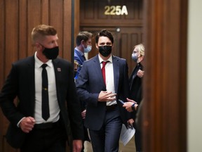Prime Minister Justin Trudeau leaves a caucus meeting on Parliament Hill in Ottawa on Wednesday, May 4, 2022.