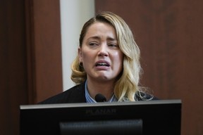 Amber Heard testifies in the Fairfax County District Court in Fairfax, Virginia, Wednesday, May 4, 2022.