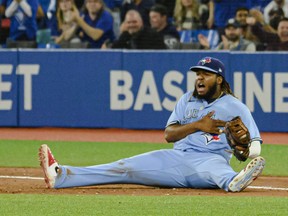 Blue Jays first baseman Vladimir Guerrero Jr. pounds his chest after digging a throw out of the dirt to make the final out of Wednesday’s 2-1 win over the Yankees at the Rogers Centre.