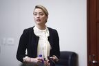 Amber Heard arrives in the courtroom at the Fairfax County Circuit Court in Fairfax, Va., Thursday, May 5, 2022. 