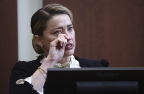 Amber Heard testifies in the courtroom at the Fairfax County Circuit Court in Fairfax, Va., Thursday, May 5, 2022.