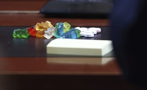On Thursday, May 5, 2022, in a court of Fairfax County Circuit Court in Fairfax, Virginia, a pile of gummy bears and other candies sits at the table in front of actor Johnny Depp.