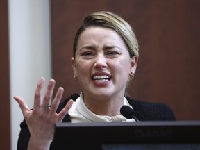 Amber Heard testifies in the courtroom at the Fairfax County Circuit Court in Fairfax, Va., Thursday, May 5, 2022.