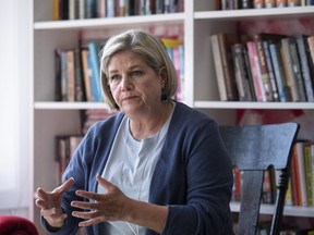 Ontario NDP Leader Andrea Horwath announces plans to expand health care for Ontarians as she campaigns at the Dog-Eared Cafe in Paris, Ont., Thursday, May 12, 2022.