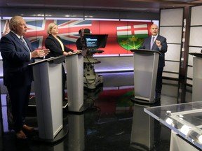 Ontario Progressive Conservative Party Leader Doug Ford, left to right, Ontario New Democratic Party Leader Andrea Horwath, Ontario Liberal Party Leader Steven Del Duca and Green Party of Ontario Leader Mike Schreiner debate during the Ontario party leaders' debate, in Toronto, Monday, May 16, 2022.