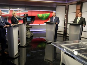 Ontario Progressive Conservative Party Leader Doug Ford, left to right, Ontario New Democratic Party Leader Andrea Horwath, Ontario Liberal Party Leader Steven Del Duca and Green Party of Ontario Leader Mike Schreiner debate during the Ontario party leaders' debate, in Toronto, Monday, May 16, 2022.