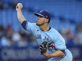 Blue Jays starting pitcher Jose Berrios works during the first inning against the Seattle Mariners in Toronto, Tuesday, May 17, 2022.