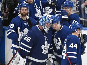 Maple Leafs players console each other after dropping Game 7 to the Tampa Bay Lightning. Toronto became the first team in league history to drop five consecutive Game 7s.