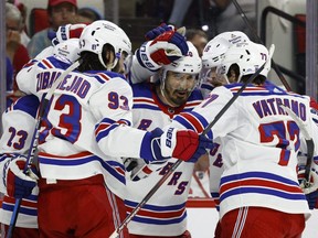 Rangers forward Chris Kreider (20) reacts with his teammates following a third-half goal against the Hurricanes in Game 7 of the Stanley Cup Playoffs second round at PNC Arena in Raleigh, NC, Monday, May 30, 2022.