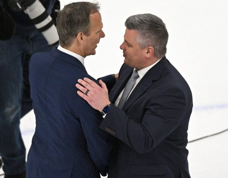 Tampa Bay Lightning coach Jon Cooper, left, warned that if the Leafs break up their core members, his team would try to pick them up. USA TODAY SPORTS