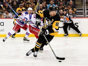 Sidney Crosby #87 of the Pittsburgh Penguins controls the puck against the New York Rangers during the first period of Game Four of the First Round of the 2022 Stanley Cup Playoffs at PPG PAINTS Arena