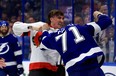 Alex Formenton #10 of the Ottawa Senators and Anthony Cirelli #71 of the Tampa Bay Lightning fight in the third period during a game  at Amalie Arena on March 01, 2022 in Tampa, Florida. (Photo by Mike Ehrmann/Getty Images)