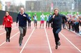 Britain's Catherine, Duchess of Cambridge (L), Britain's Prince William, Duke of Cambridge (C) and Britain's Prince Harry (R) take part in a relay race, during a training event to promote the charity Heads Together, at the Queen Elizabeth Olympic Park in London, on February 5, 2017. (Photo by ALASTAIR GRANT/POOL/AFP via Getty Images)