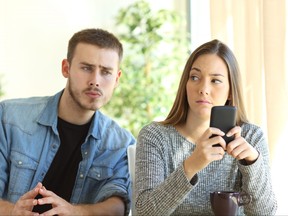 A husband thinks it's fine to sneak a peek at his wife's screen when she's doing something she feels is private.