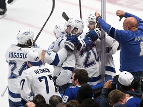 Tampa Bay Lightning forward Nick Paul (20) celebrates with teammates after scoring a goal against the Toronto Maple Leafs in game seven of the first round of the 2022 Stanley Cup Playoffs at Scotiabank Arena.