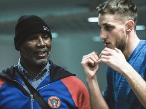 Lennox Lewis, left, and Toronto boxer Zsolt Daranyi. Supplied photo