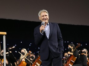 Harrison Ford of the upcoming fifth instalment of the “Indiana Jones” franchise honours composer John Williams on his 90th birthday at Star Wars Celebration in Anaheim, Calif., on May 26, 2022.