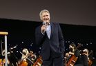 Harrison Ford of the upcoming fifth instalment of the “Indiana Jones” franchise honours composer John Williams on his 90th birthday at Star Wars Celebration in Anaheim, Calif., on May 26, 2022. 