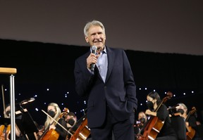 Harrison Ford of the upcoming fifth instalment of the “Indiana Jones” franchise honours composer John Williams on his 90th birthday at Star Wars Celebration in Anaheim, Calif., on May 26, 2022.