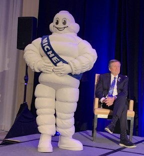 Toronto Mayor John Tory with the famous Michelin Man at the press conference announcing the arrival of the Michelin Guide to Canada